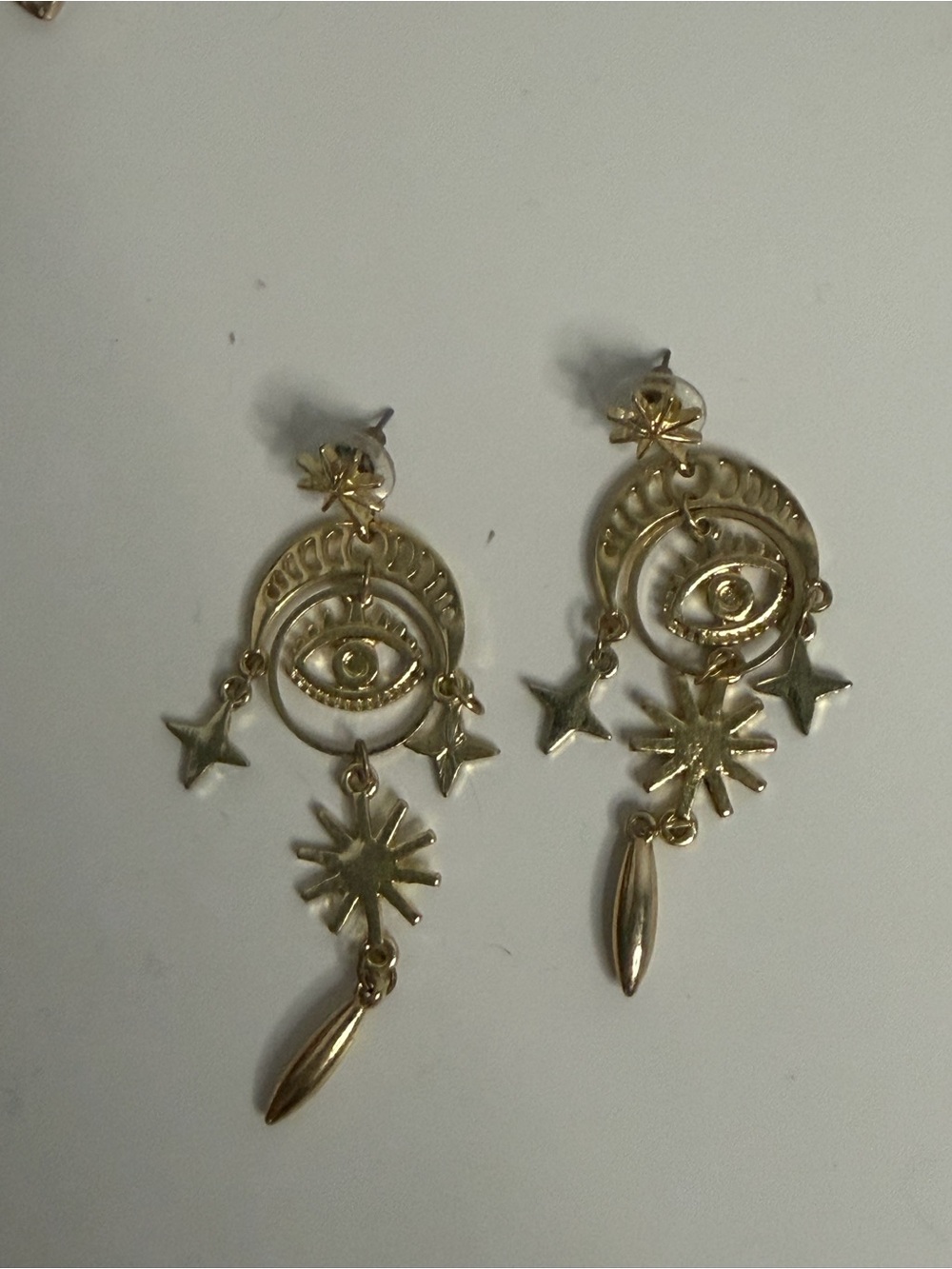 Anthropologie Gold Eye and Star Chandelier Earrings